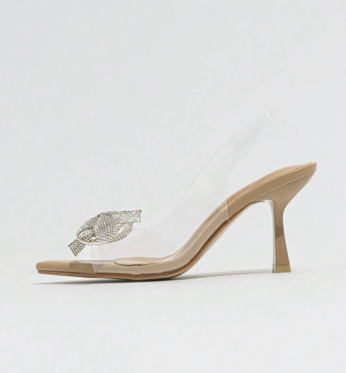 Zapatilla transparente nude con moño cristal