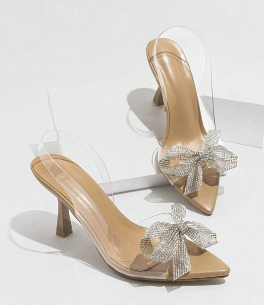 Zapatilla transparente nude con moño cristal